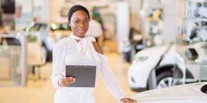 dealer floor plan woman and car